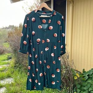 Green Biden dress with abstract circle pattern